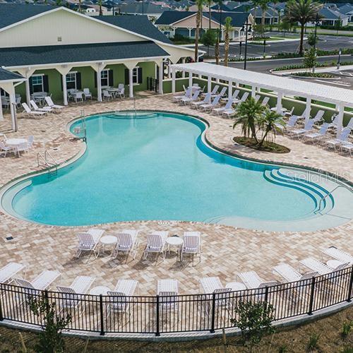 3088 Berwyn Way The Villages, FL 32162 - Photo 41 of 60 a view of a swimming pool with a patio
