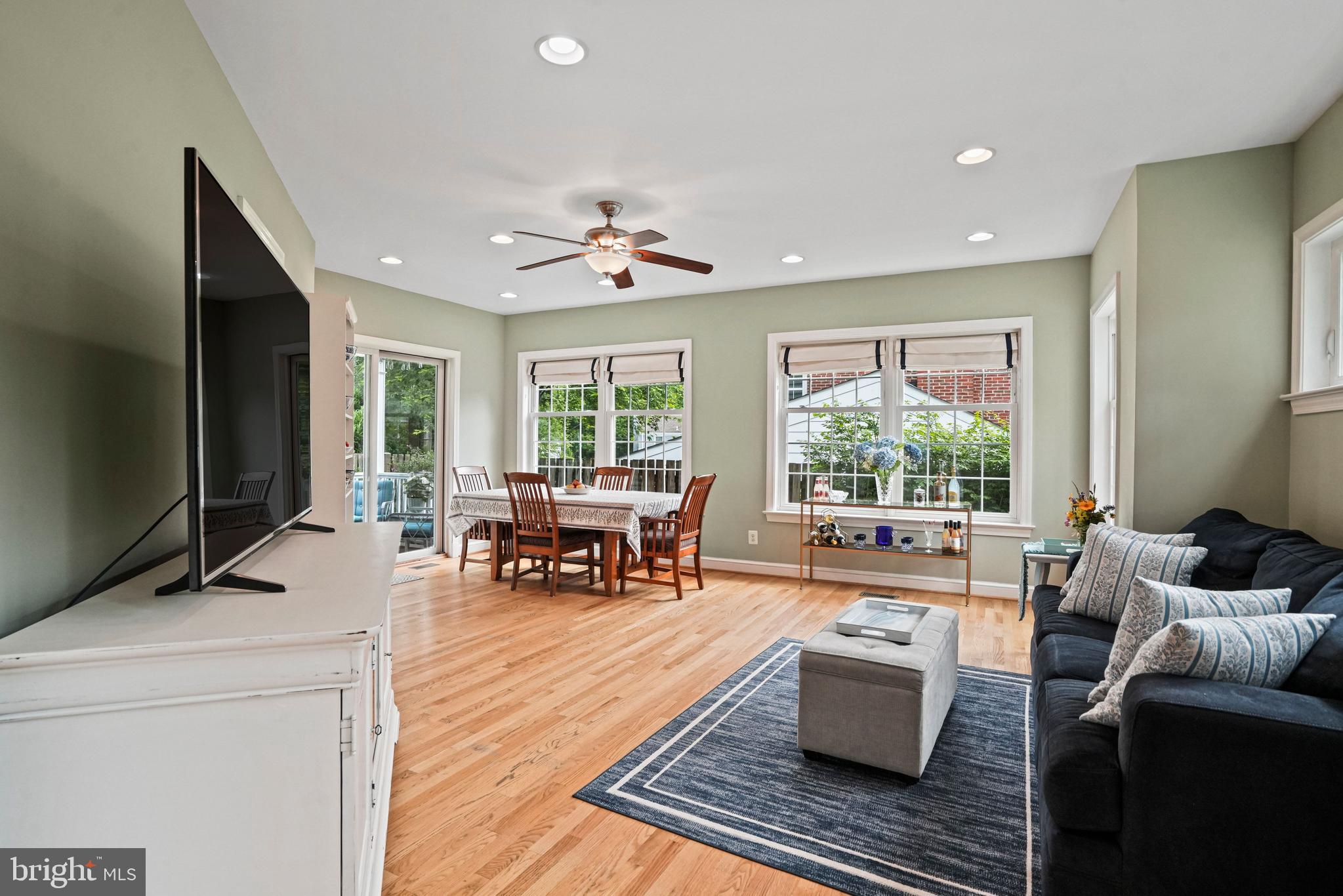 1907 Brisbane Street Silver Spring, MD 20902 - Photo 15 of 39 a living room with furniture and large windows