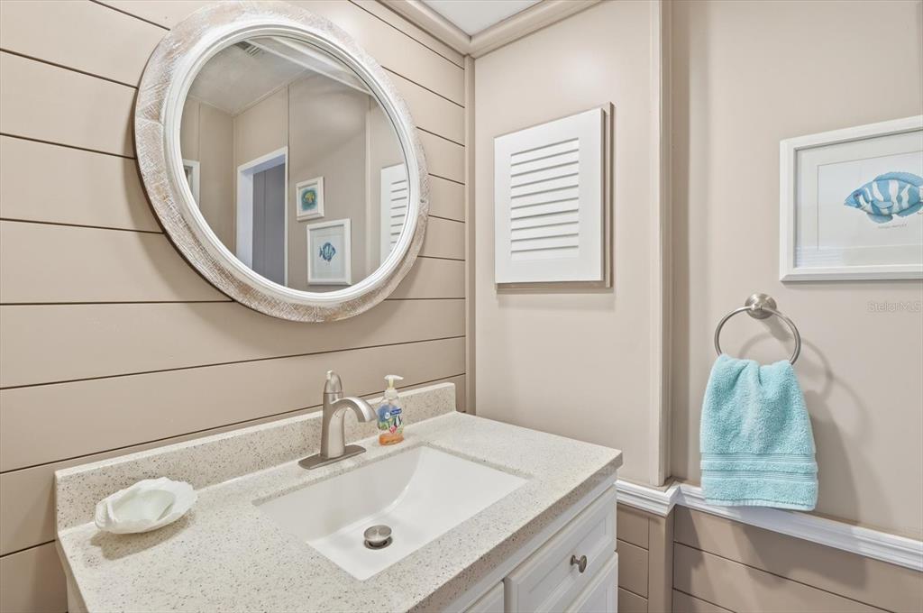 2285 North Loma Point Hernando, FL 34442 - Photo 25 of 36 a bathroom with a sink and a mirror
