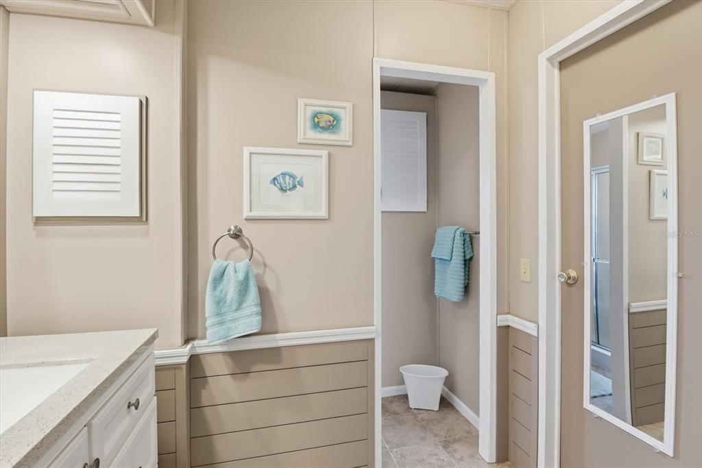 2285 North Loma Point Hernando, FL 34442 - Photo 26 of 36 a bathroom with a granite countertop sink toilet and shower