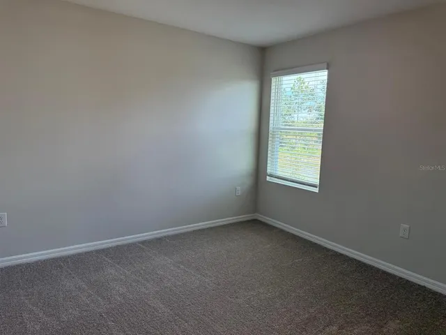 a view of a hallway with entryway