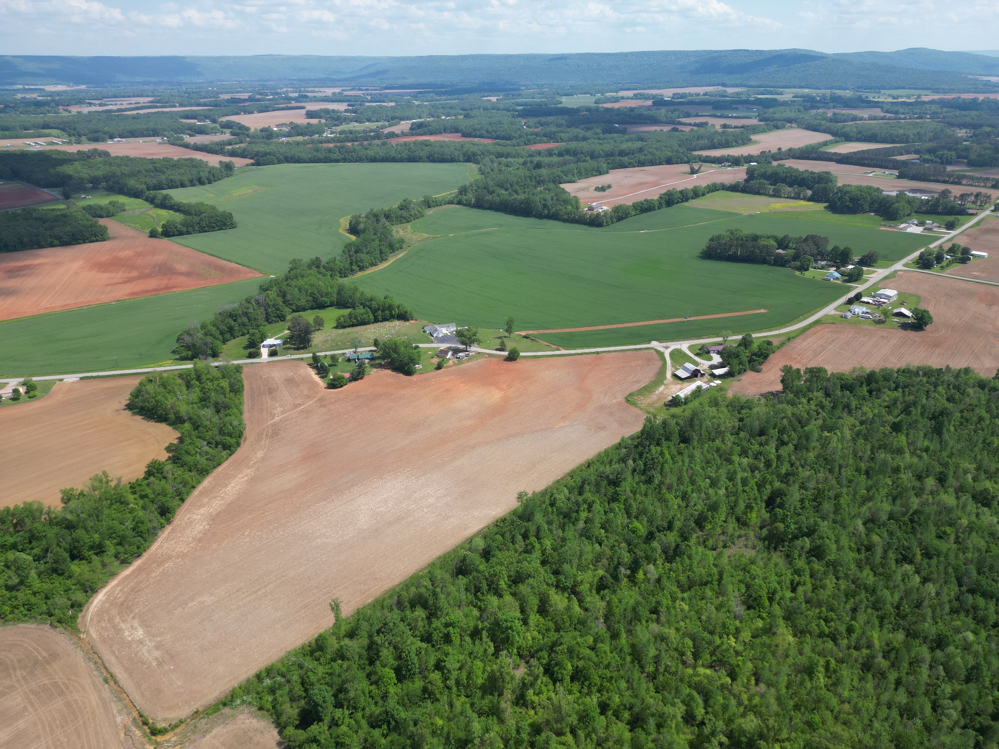 0 Gum Creek Road Decherd, TN 37324 - Photo 3 of 6 an aerial view of a house with a yard and lake view