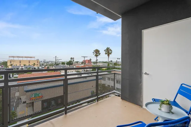 a living room with furniture fireplace and flat screen tv
