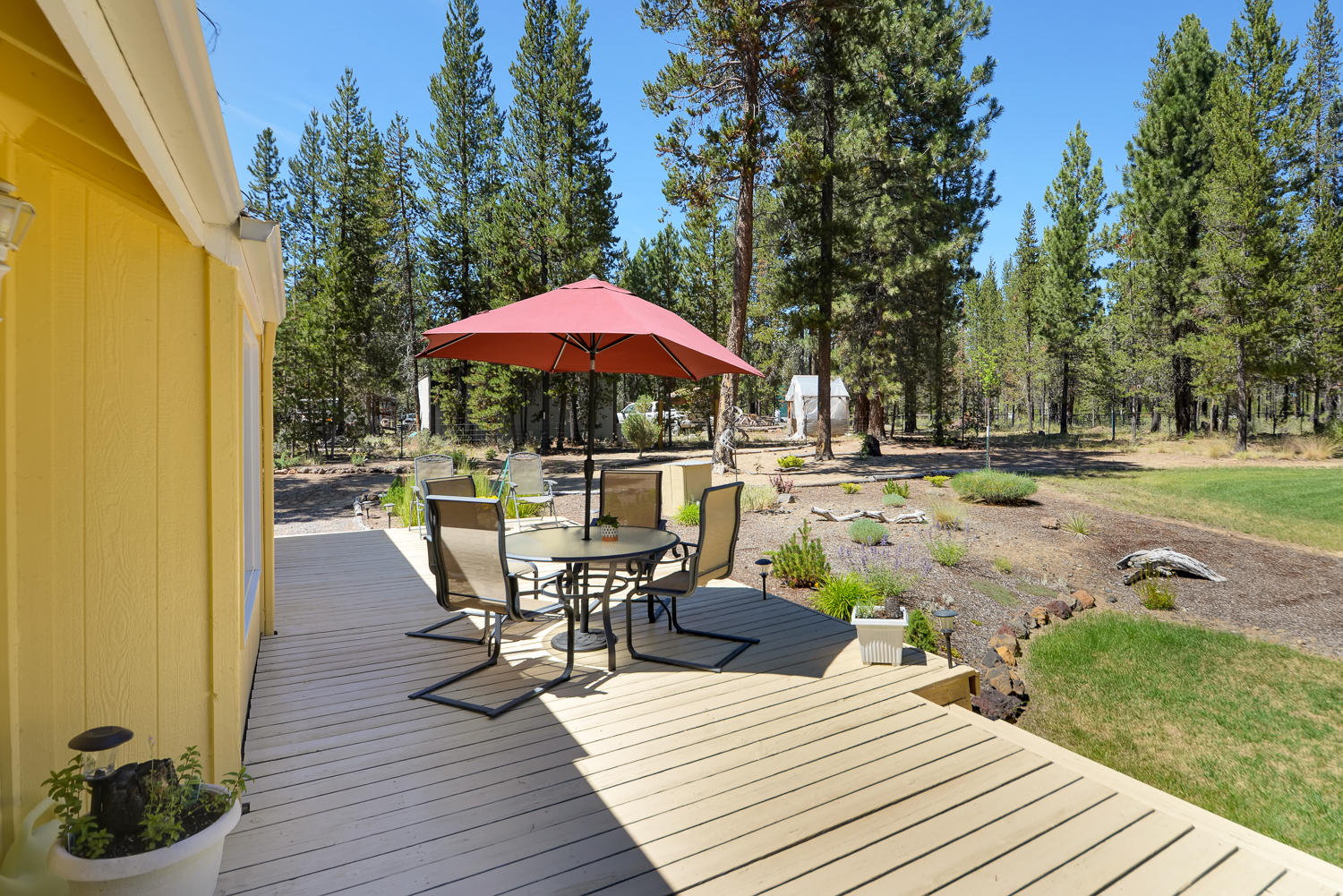 52311 Ammon Road La Pine, OR 97739 - Photo 30 of 39 a view of outdoor space yard deck patio and outdoor kitchen