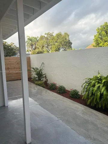 a view of yard with outdoor seating