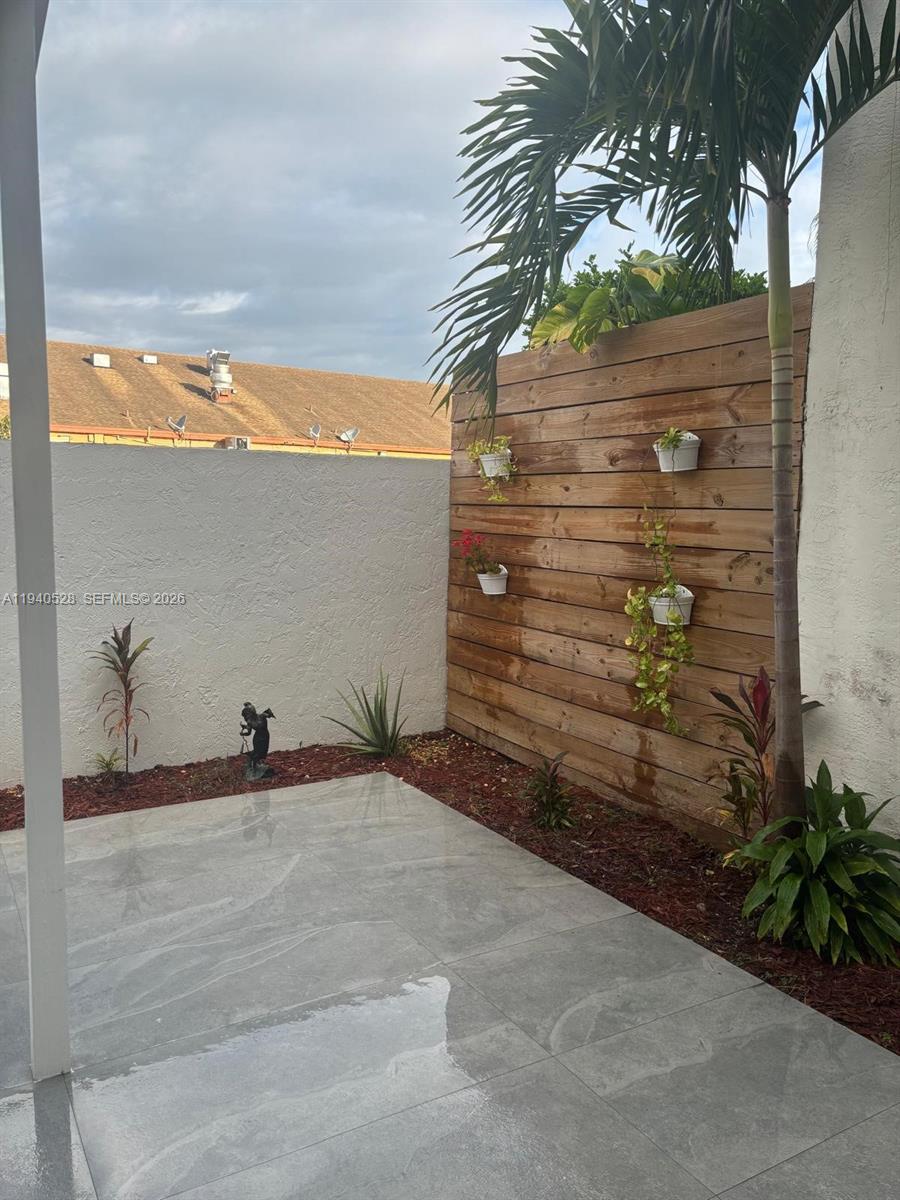 13911 Southwest 100th Lane Miami, FL 33186 - Photo 48 of 55 a view of a backyard of the house