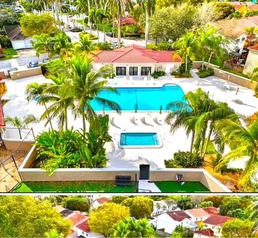 a view of multiple house with a street