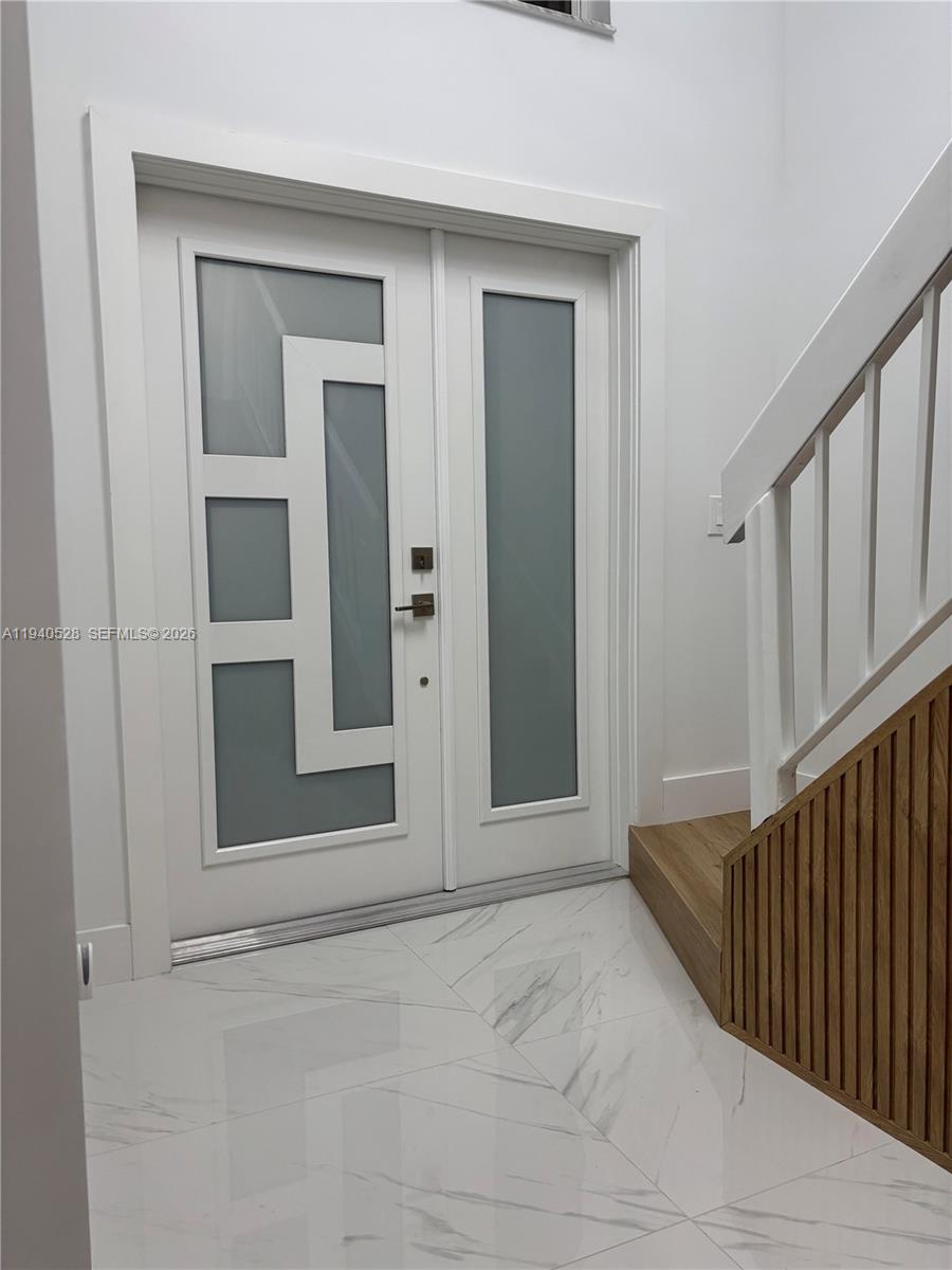 13911 Southwest 100th Lane Miami, FL 33186 - Photo 8 of 55 a view of an entryway door