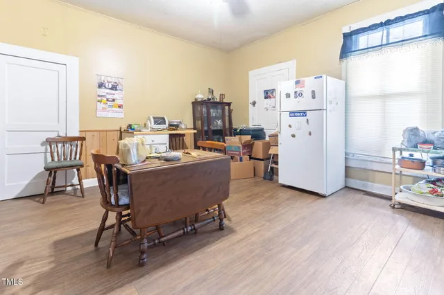 aerial view of a house with a yard