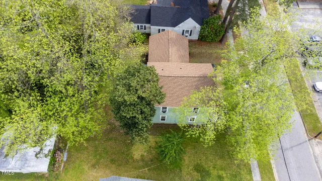 an aerial view of ocean with residential house with outdoor space and lake view