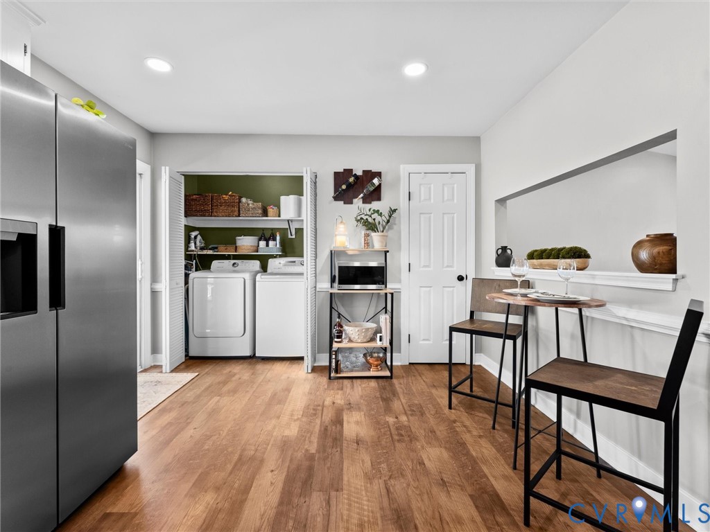 4507 Parrish Branch Road Midlothian, VA 23112 - Photo 20 of 40 a living room with furniture and a wooden floor
