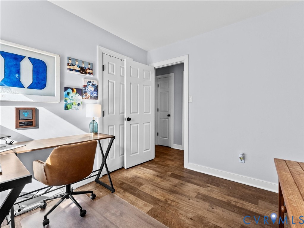 4507 Parrish Branch Road Midlothian, VA 23112 - Photo 36 of 40 a view of a workspace with furniture and wooden floor