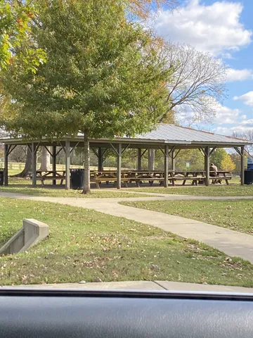 a view of a house with a yard porch and sitting area