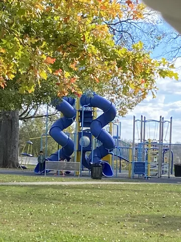 a view of street with car parked