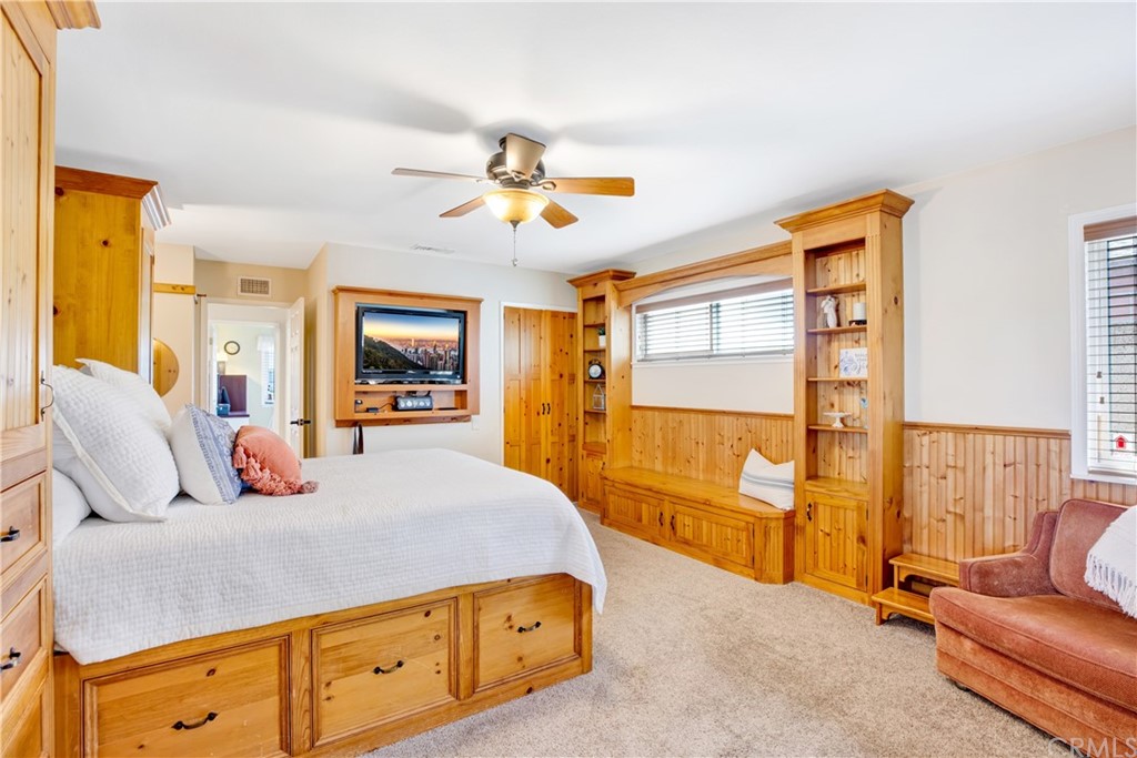 844 Eastman Place San Pedro, CA 90731 - Photo 22 of 44 a bedroom with a bed dresser and a window