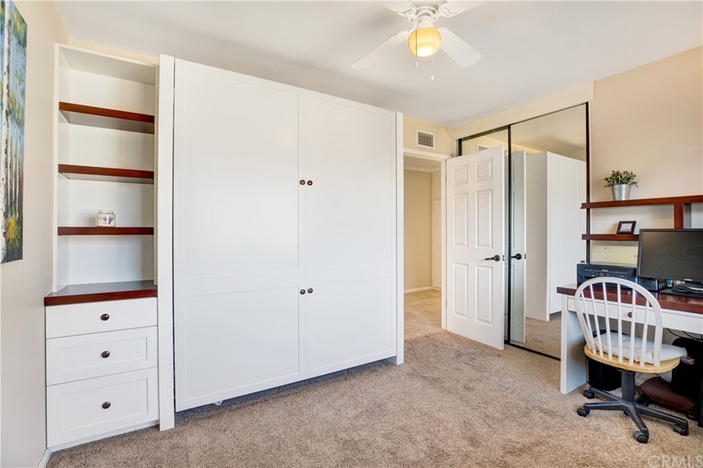 844 Eastman Place San Pedro, CA 90731 - Photo 29 of 44 a bedroom with a bed and a cabinet