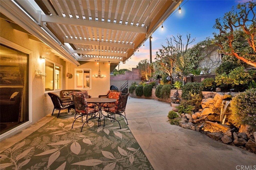 844 Eastman Place San Pedro, CA 90731 - Photo 37 of 44 a view of a patio with table and chairs and potted plants