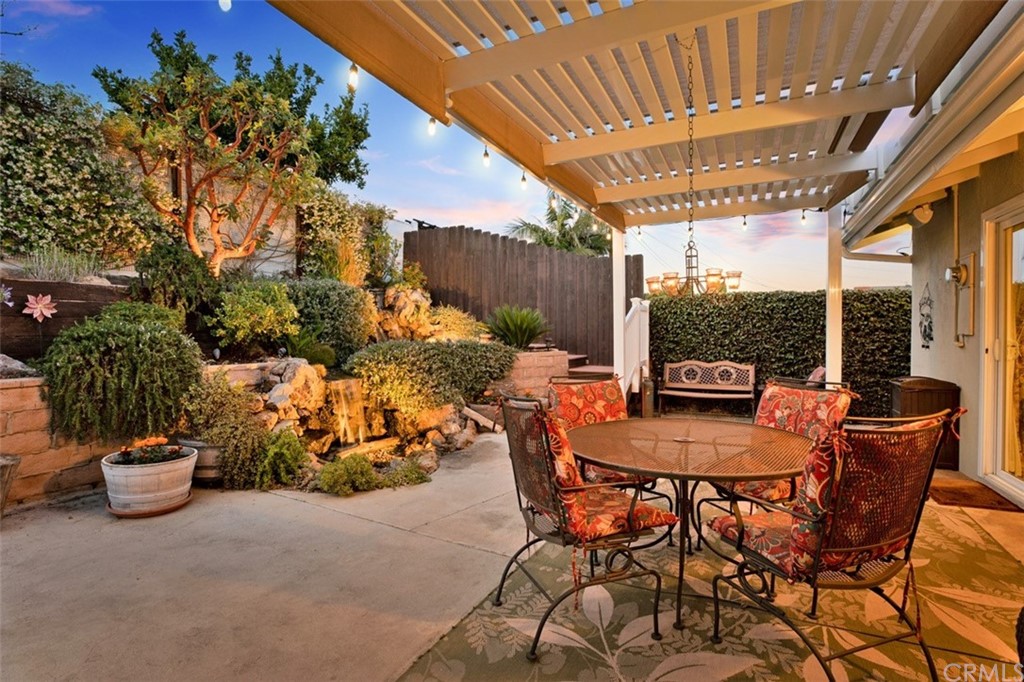 844 Eastman Place San Pedro, CA 90731 - Photo 38 of 44 a view of a patio with a table and chairs and potted plants