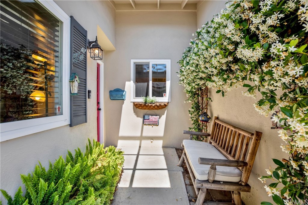 844 Eastman Place San Pedro, CA 90731 - Photo 4 of 44 a balcony with table and chairs with potted plants
