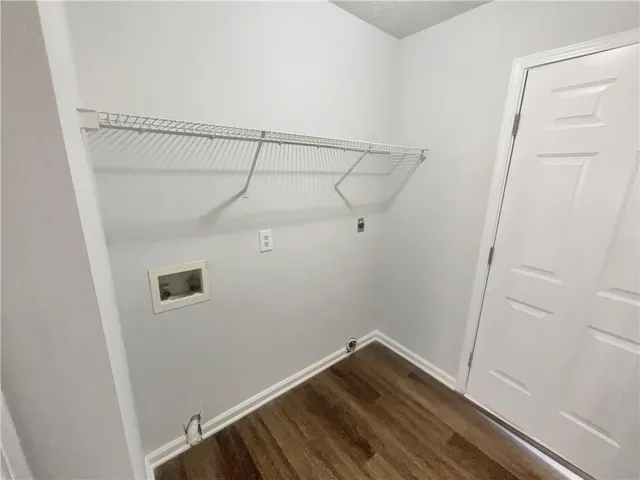 a view of a room with racks on the wall