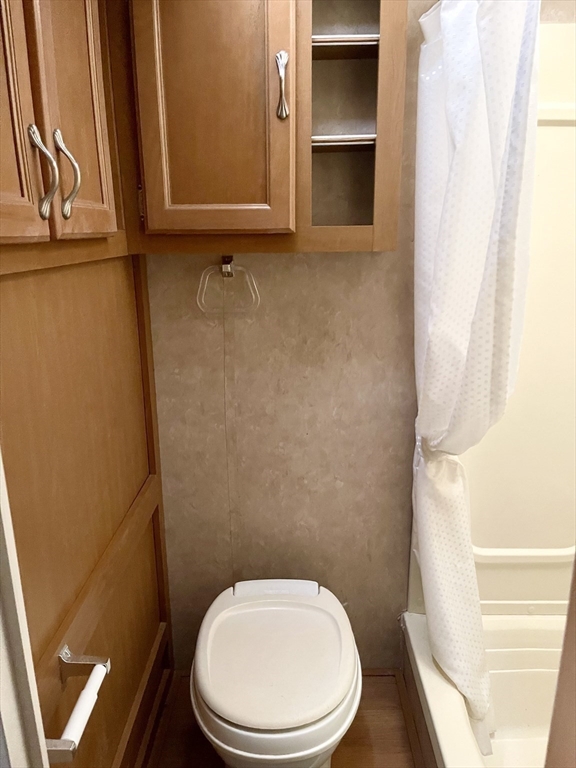 67 Crane Road Chester, MA 01011 - Photo 20 of 21 a white toilet sitting next to a shower