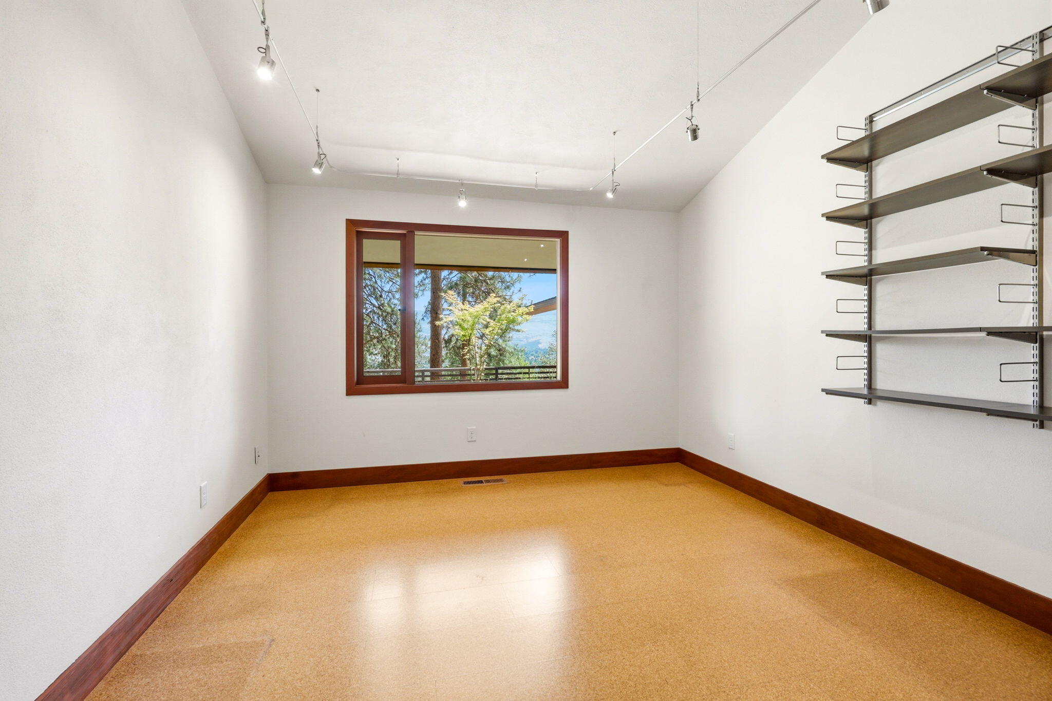 155 Terrace Street Ashland, OR 97520 - Photo 72 of 93 an empty room with cabinet and window