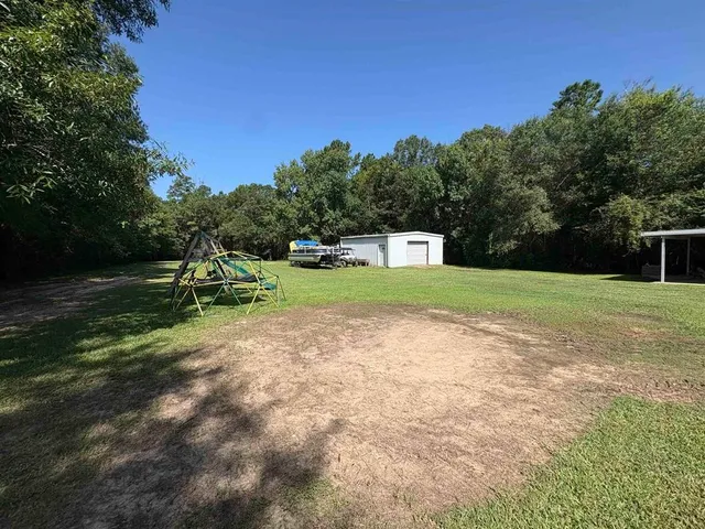 a view of a golf course with a park