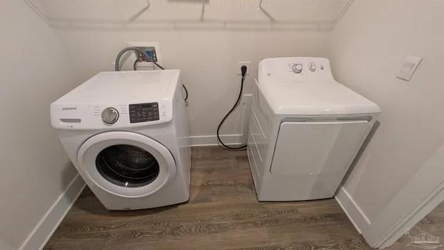 a utility room with dryer and washer