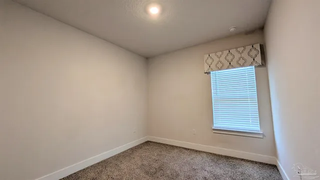 a view of a small space with a window