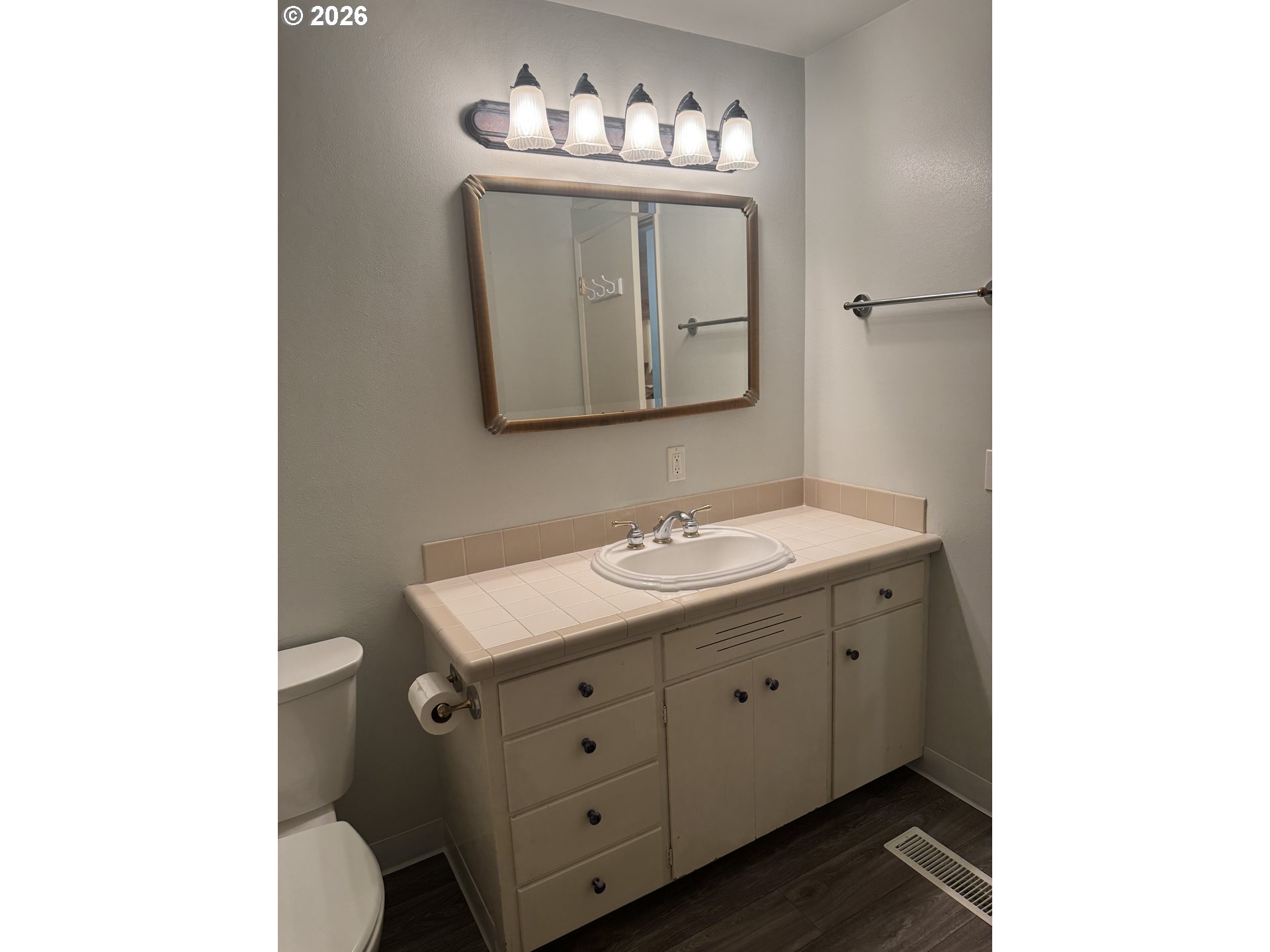 260 Susan Street Eugene, OR 97404 - Photo 16 of 33 a bathroom with a toilet sink and mirror