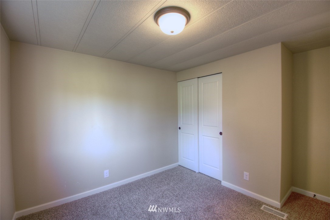18645 Hilt Street Southwest Rochester, WA 98579 - Photo 22 of 32 an empty room with a window