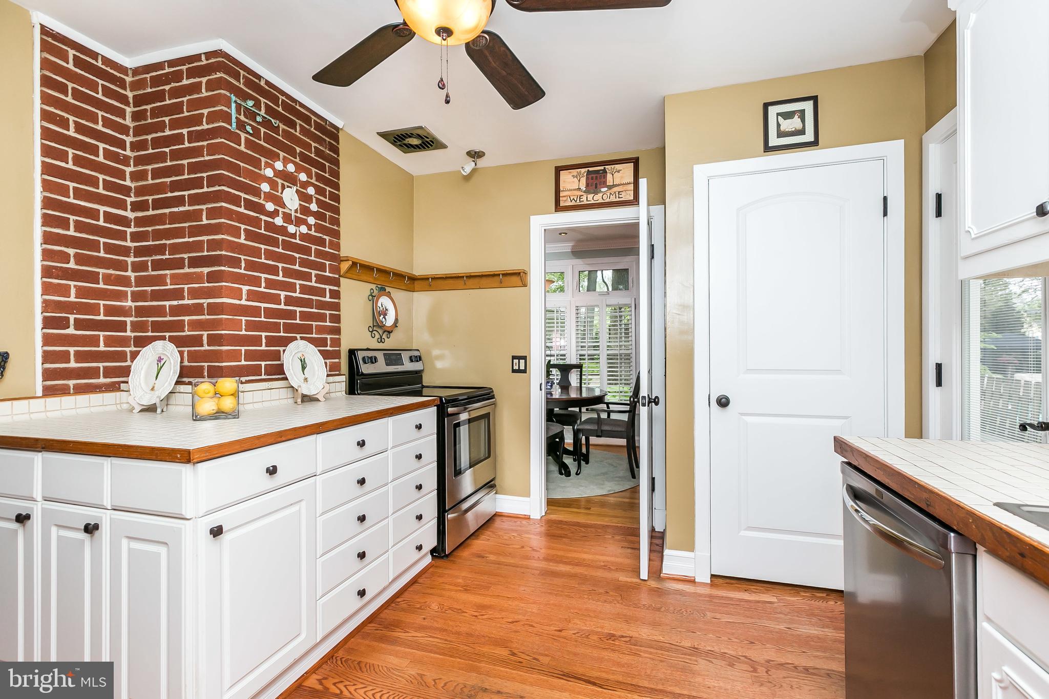 2103 Oak Lodge Road Catonsville, MD 21228 - Photo 12 of 39 Lots of character with tile counters & brick