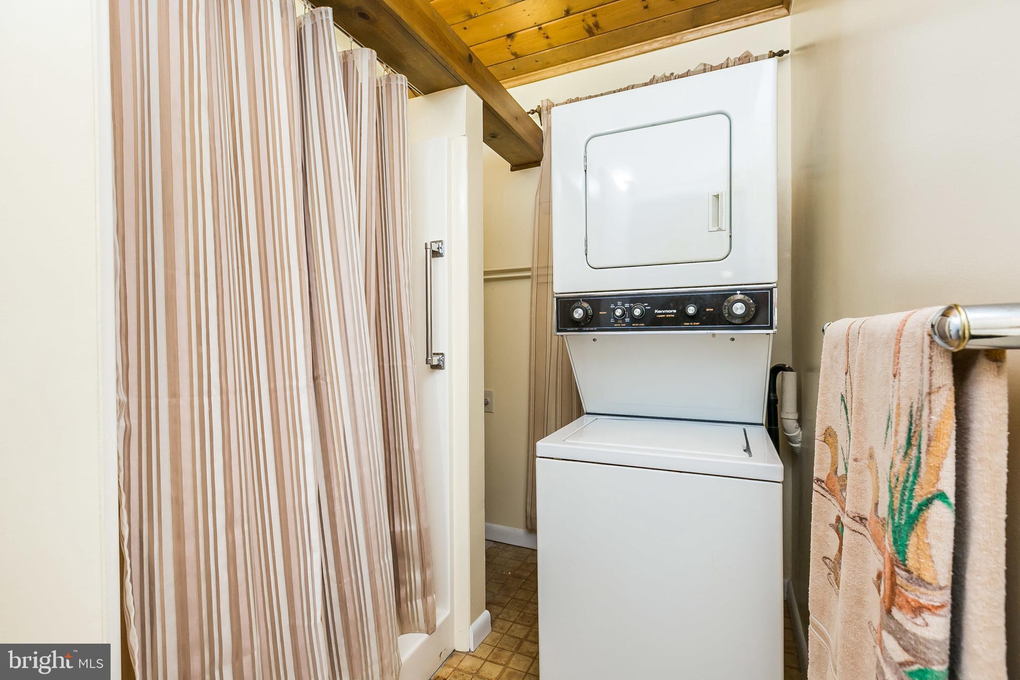 2103 Oak Lodge Road Catonsville, MD 21228 - Photo 28 of 39 Stacked laundry unit & separate shower stall