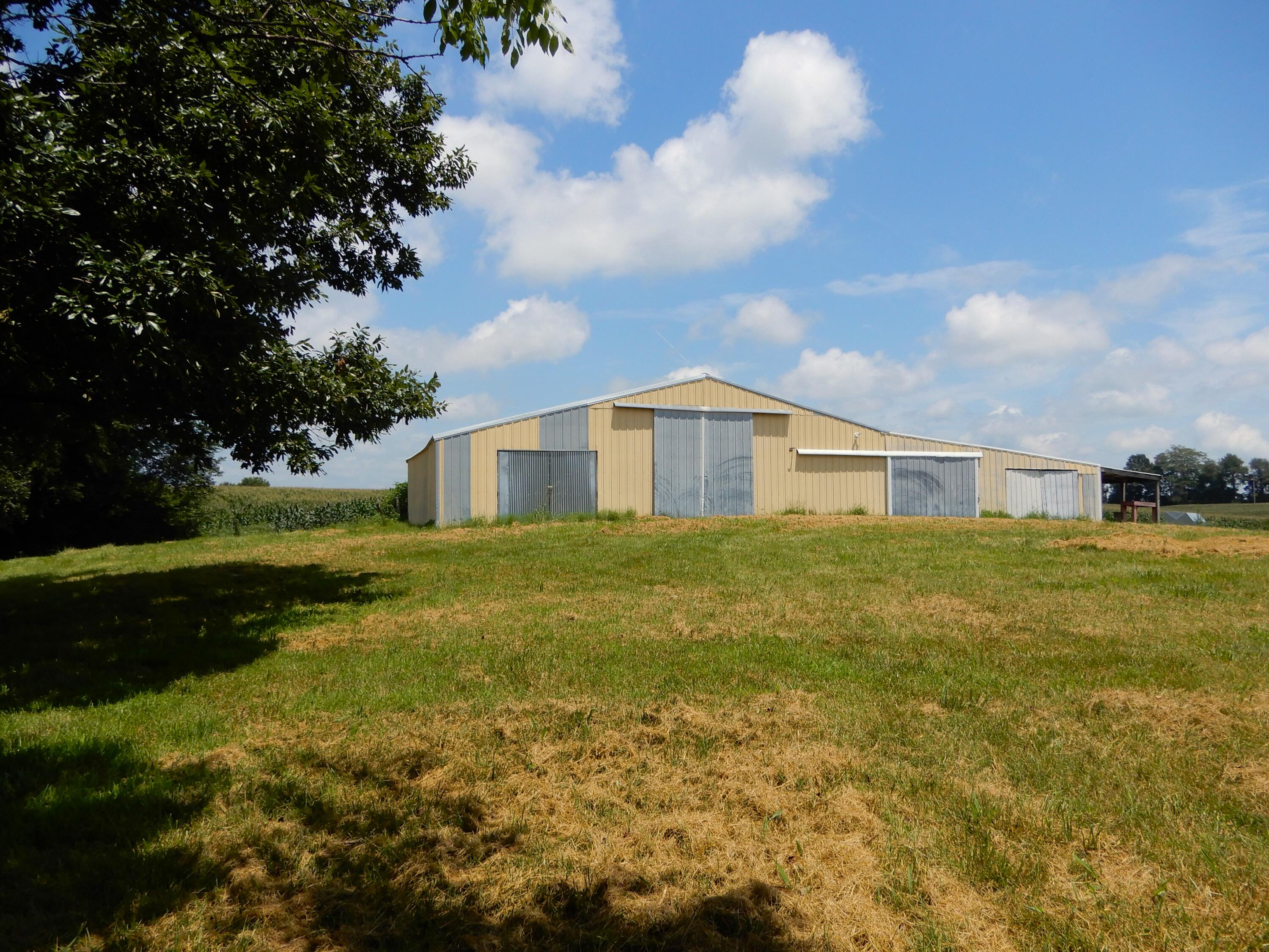 1875 State Route 384 Fancy Farm, KY 42039 - Photo 63 of 72 Large Barn, main doors 11. 7 ft tall.