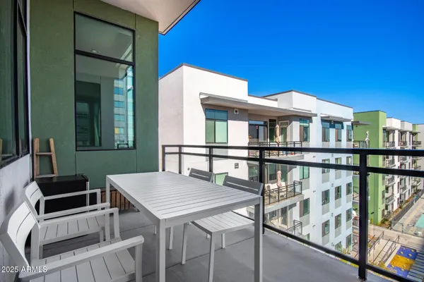 a room with lots of windows and musical instruments