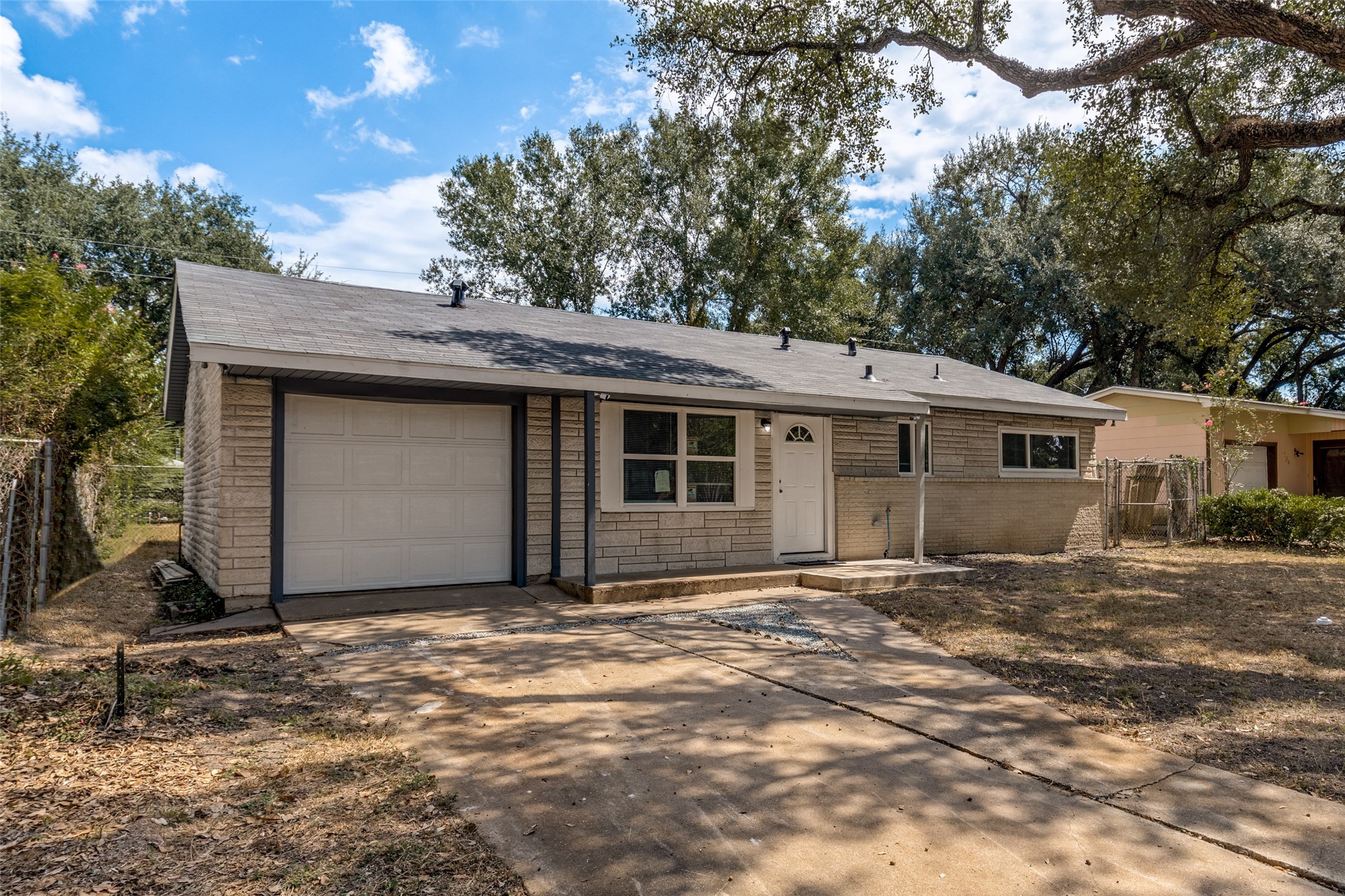 200 Pine Street Prairie View, TX 77446 - Photo 3 of 25 a front view of a house with a garage