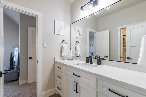 a bathroom with a toilet and a bathtub