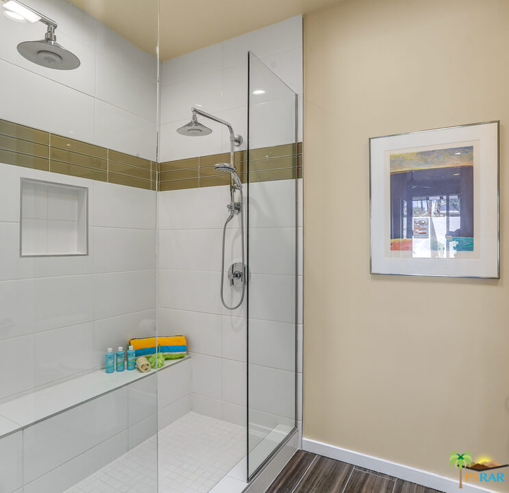 1314 East Andreas Road Palm Springs, CA 92262 - Photo 21 of 34 a bathroom with a window and a shower