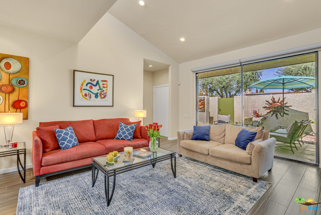 1314 East Andreas Road Palm Springs, CA 92262 - Photo 5 of 34 a living room with furniture and a large window