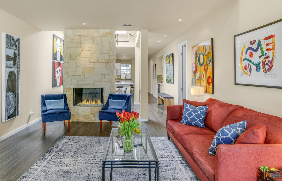 1314 East Andreas Road Palm Springs, CA 92262 - Photo 7 of 34 a living room with furniture fireplace and window