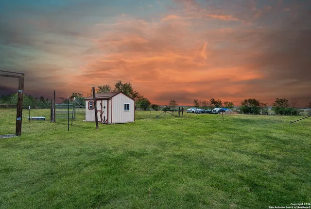 a view of a terrace with wooden floor and city view