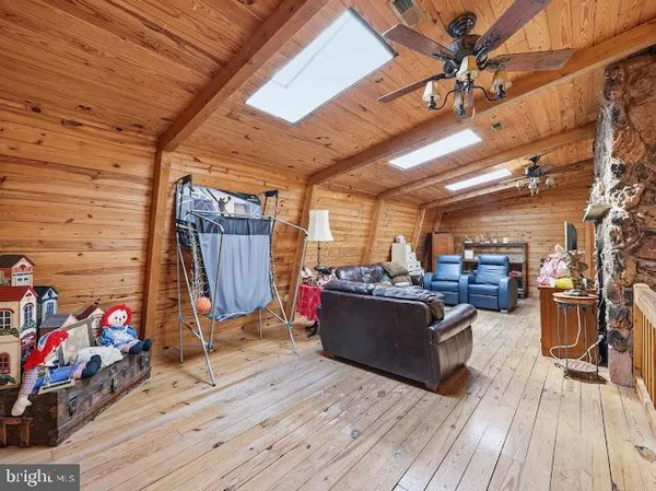 a bedroom with a bed and a desk