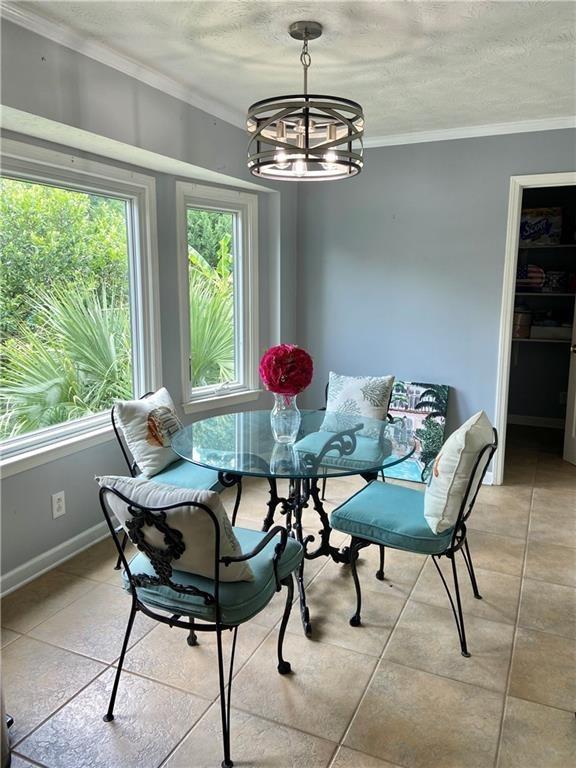 1679 Rangewood Drive Southwest Lilburn, GA 30047 - Photo 11 of 22 a view of a dining room with furniture window and outside view