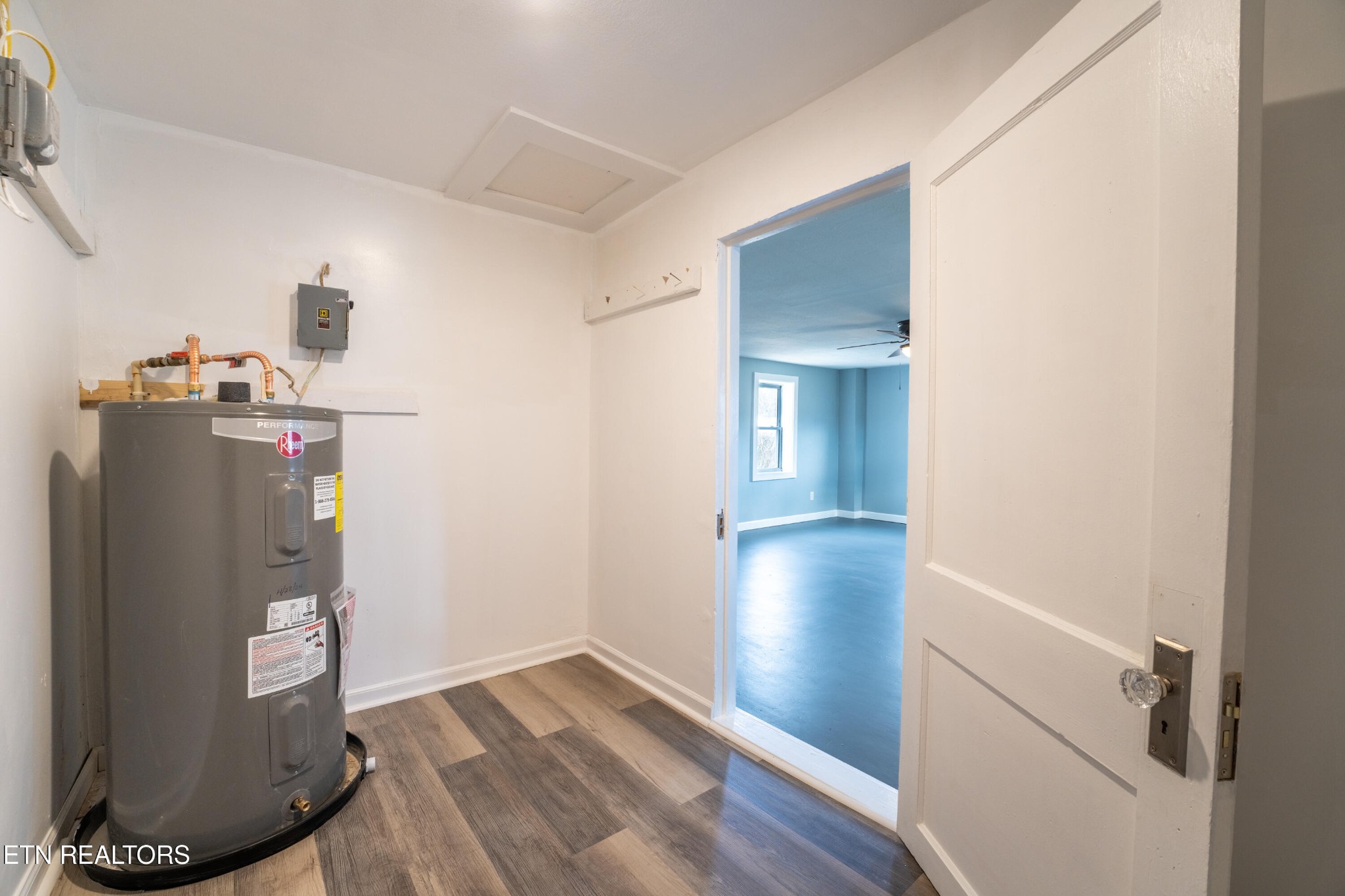 7909 Warwick Lane Corryton, TN 37721 - Photo 20 of 33 a view of a storage & utility room with closet and wooden floor