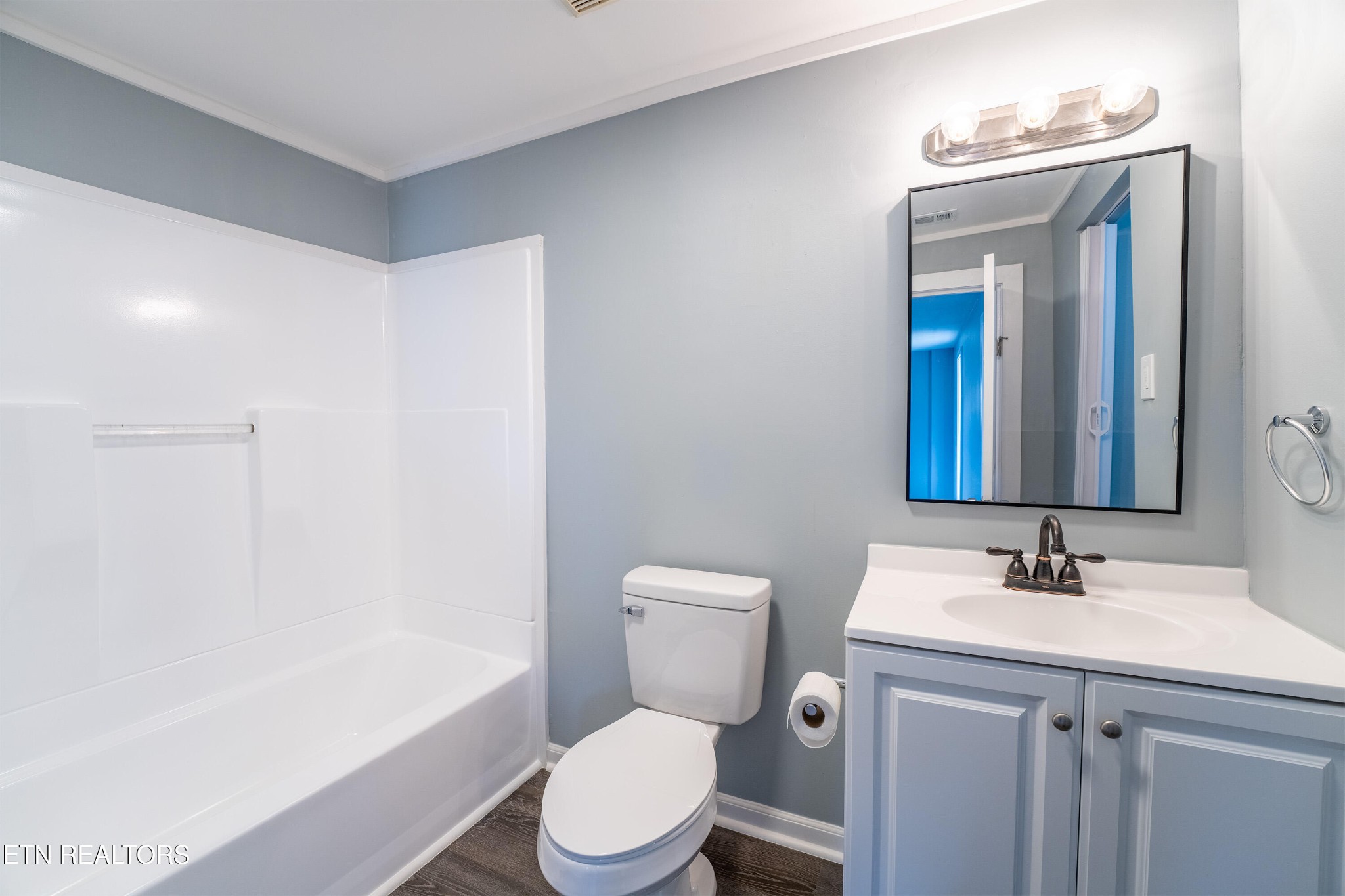 7909 Warwick Lane Corryton, TN 37721 - Photo 21 of 33 a bathroom with a sink a toilet and shower