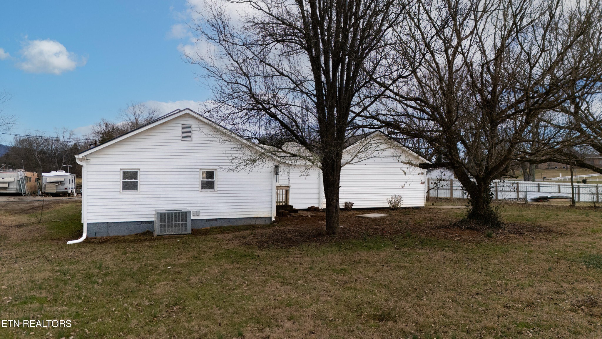 7909 Warwick Lane Corryton, TN 37721 - Photo 25 of 33 a view of a house with a yard