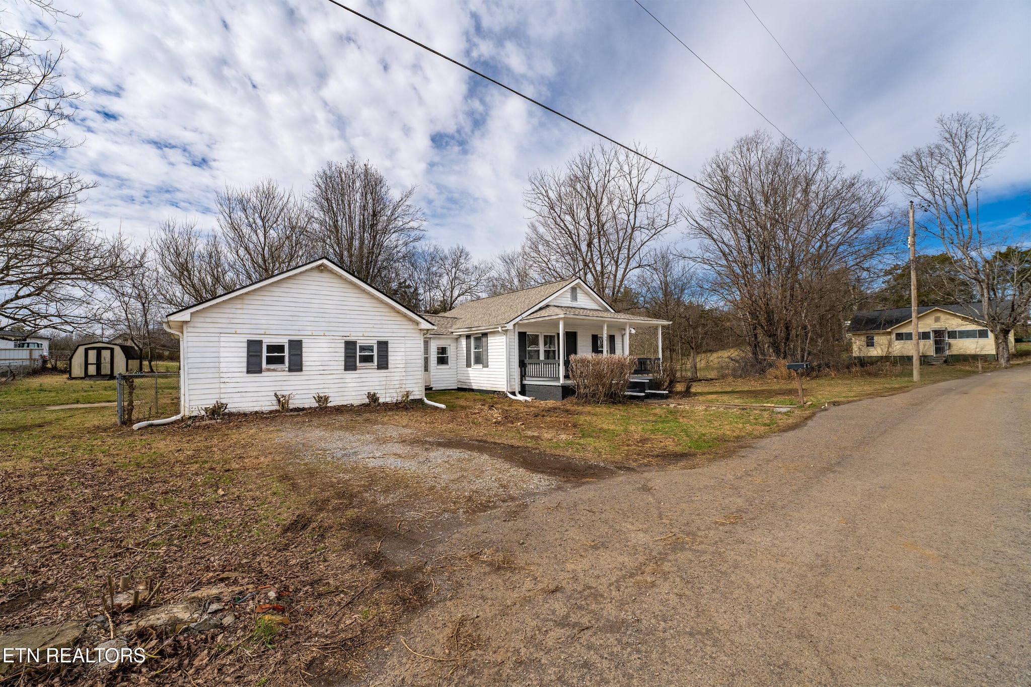 7909 Warwick Lane Corryton, TN 37721 - Photo 3 of 33 a front view of a house with yard