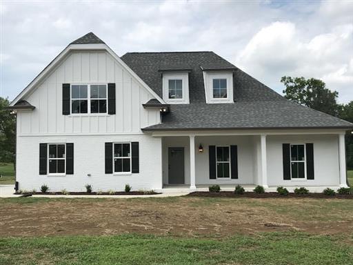 40 Cedar Grove Road Lebanon, TN 37087 - Photo 1 of 16 a front view of a house with a yard
