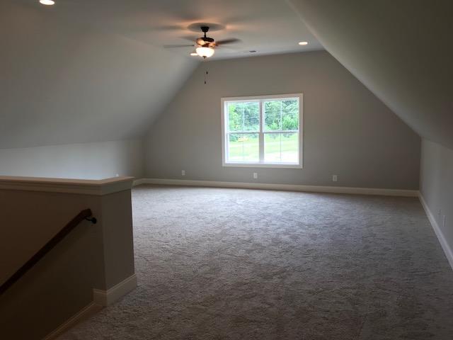40 Cedar Grove Road Lebanon, TN 37087 - Photo 12 of 16 en empty room with windows and ceiling fan