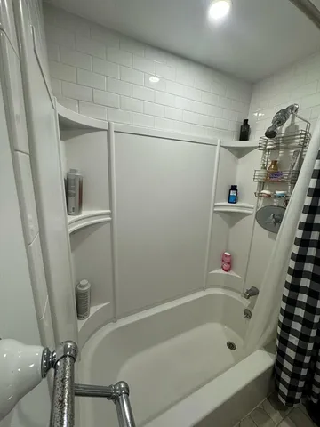 a bathroom with a bathtub